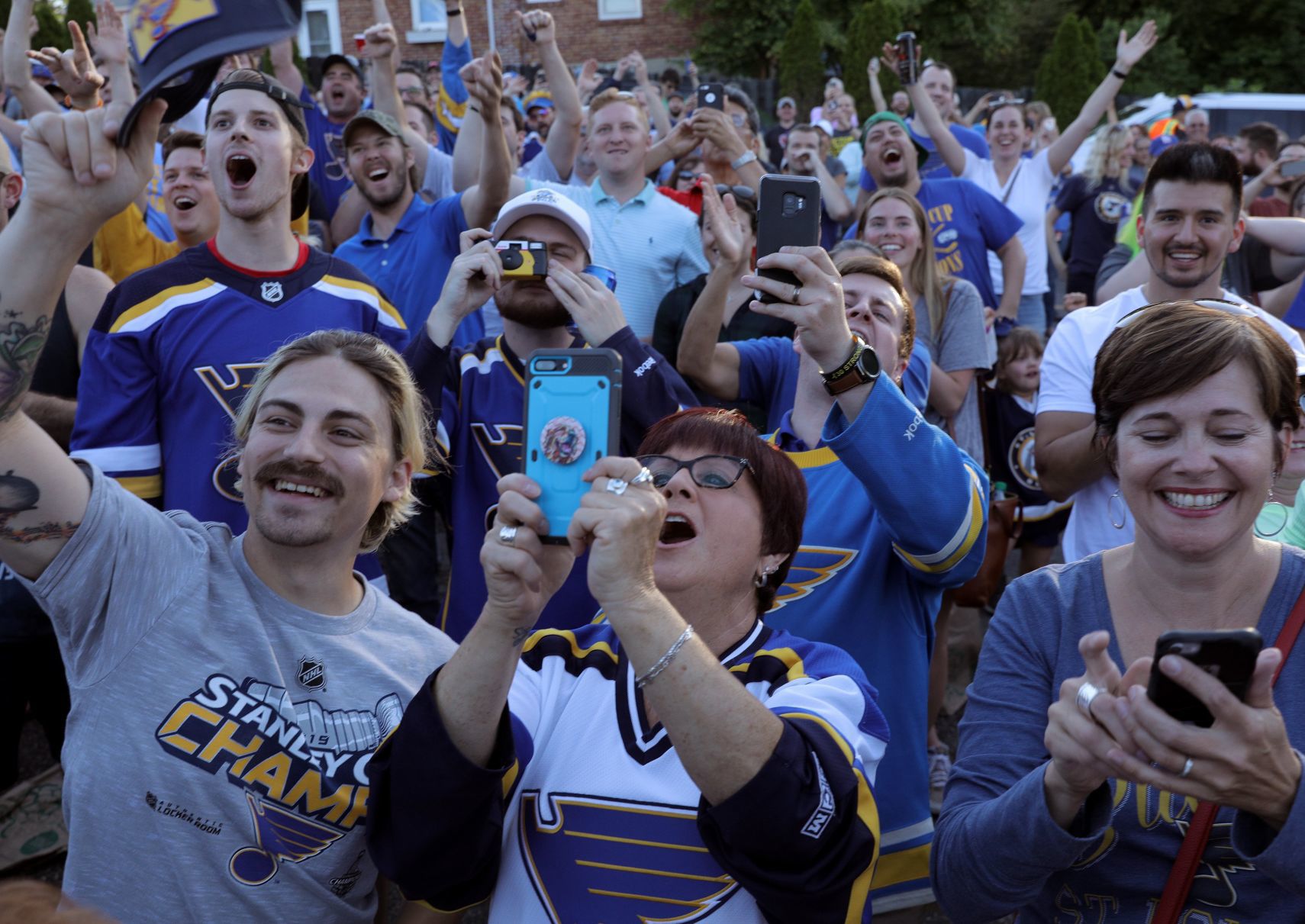Blues celebrate at O.B. Clark's as fans celebrate with them